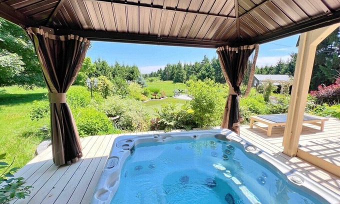 Uxbridge Ski Chalet | This cozy cottage offers a private hot tub, breathtaking forest views, and ultimate tranquillity