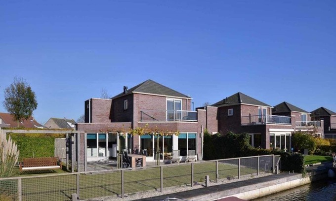Oude-Tonge House | This house is completely surrounded by a fence and it has a trampoline, perfect for children. Beauti