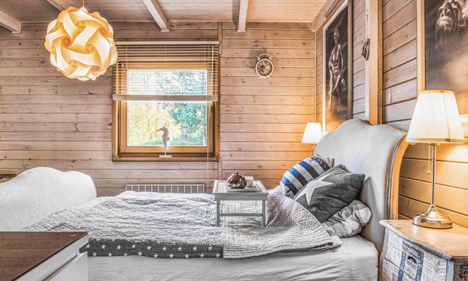 Szemud House | This lively cottage is located in the eastern interior of Poland just 200 meters from the lake.