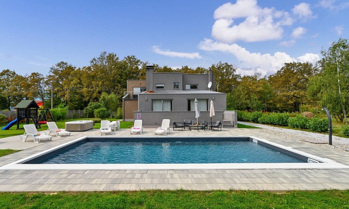 Pisarovina House | This modern vacation home is located about twenty kilometers from Zagreb in the beautiful nature, su