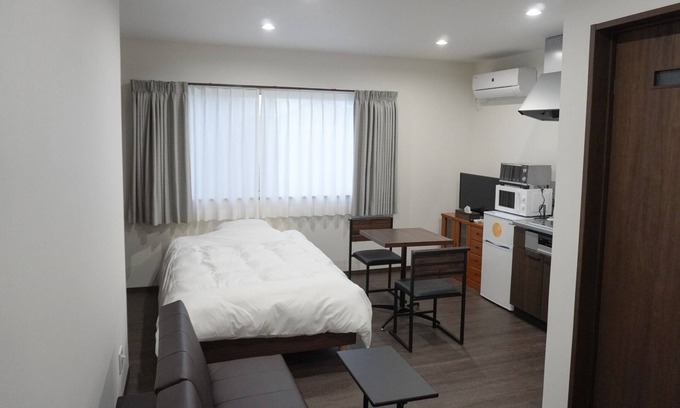 Awaji Apartment | Tiz wanAkashi Kaikyo BridgeRoad stationBeachCo / Awaji Hyōgo