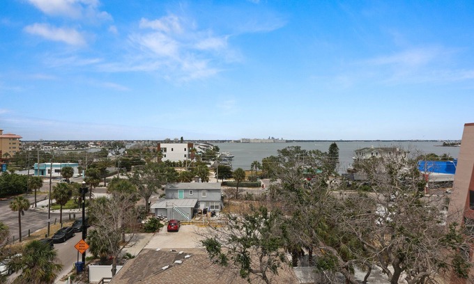 St. Pete Beach Condo | 🌅 Top-Floor NE Corner Retreat — Sunrise to Sunset Views