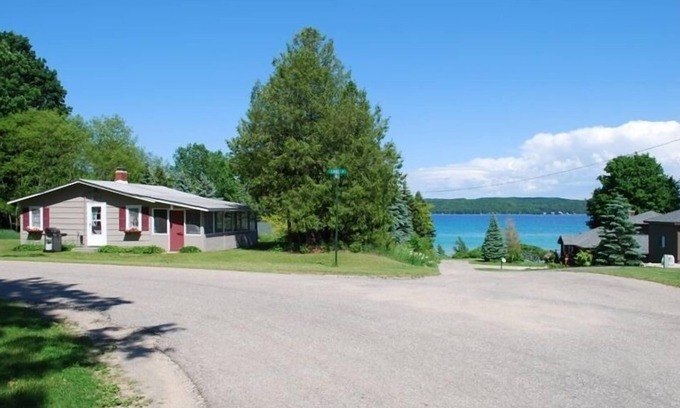 Kewadin Cottage | Torch Lake Village Cozy Cottage with private dock