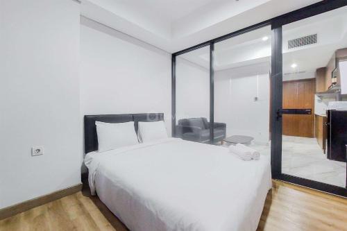 Pinang Apartment | Tranquil and Comfort Living 1BR The Smith Alam Sutera Apartment By Travelio