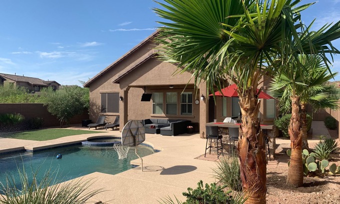 Estrella Mountain Ranch House | Tranquil Backyard with Pool/Spa, BBQ, and Putting Green.