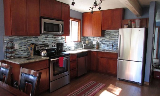 Highland Woods House | Tranquil fully renovated spacious home a few steps from Barton Meadow
