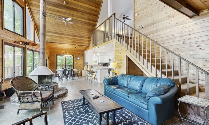Livingston House | Tranquil lake cabin with private waterfront, modern kitchen, deck & sunset views