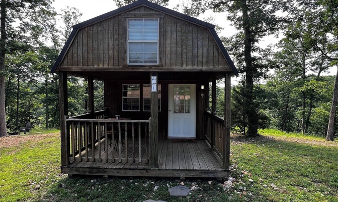 Cassville Apartment | Tranquil Retreat: Charming Pet-Friendly Tiny House Cabin Amidst Natures Beauty.