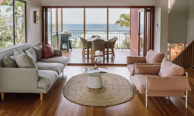 Sunrise Beach Apartment | Tranquil Treetop Retreat with Pool and Ocean Views