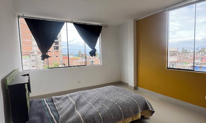 Chupaca Apartment | Travel's house in Cupaca has a shared living room and kitchen. For all V