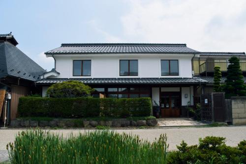Tomi Hotel | Travel Stop UNNOWA