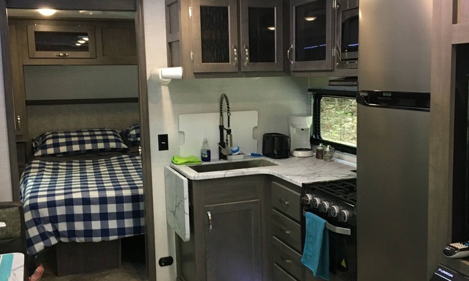 Norway House | Travel Trailer in the woods