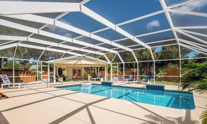 Vero Beach House | 🍹🌞 Tropical Getaway! Heated Pool, Tiki Bar, Pirate Sandbox, and Boat Parking!