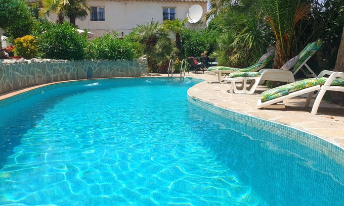 Cullar Apartment | Tropical oasis, rural Andalucía—tropical garden, huge pool, perfect for couples