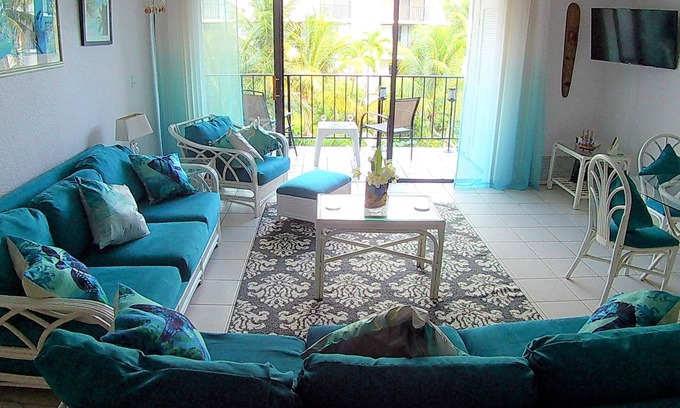 Williams Town Condo | Tropical Oasis: Ocean View ~ Pool & Bar ~ Family-Friendly