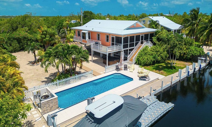 Big Pine Key House | Tropical Oasis with Beautiful Home, Pool, Dock and Tiki Hut