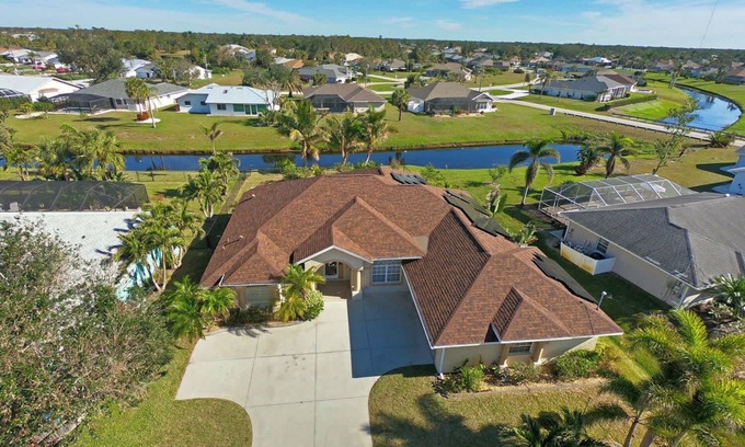 Pinehurst House | Tropical Waterfront Retreat: Poolside Paradise #138