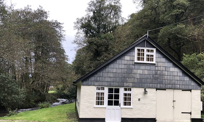 Trentishoe Cottage | TUCKING RIVER LODGE, pet friendly, with a garden in Lynton