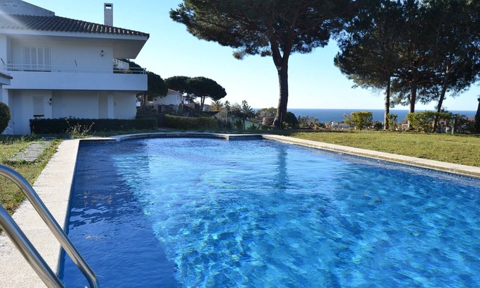 Sant Pol De Mar Villa | Twin villas with large pool and sea views near Barcelona. Free wifi, a/c