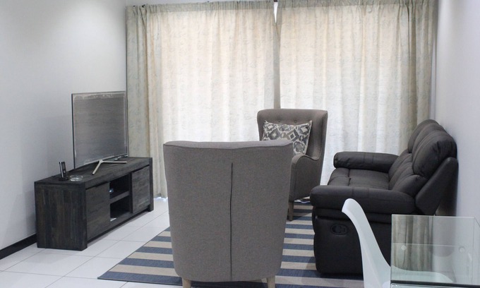 Greater Johannesburg Metropolitan Area Condo | Two bedroom ground floor condo unit with private garden, 5 min from Monte Casino