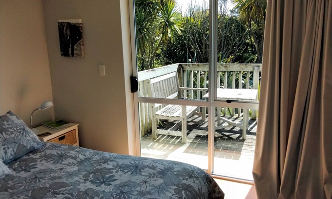 Raglan Apartment | Two minutes from famous Raglan surf beaches. Access to bush track. Dogs welcome.