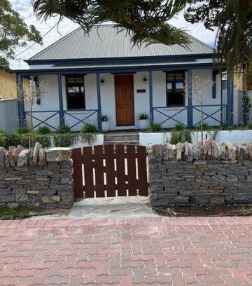 Grange House | Two roomed private suite in front of cottage