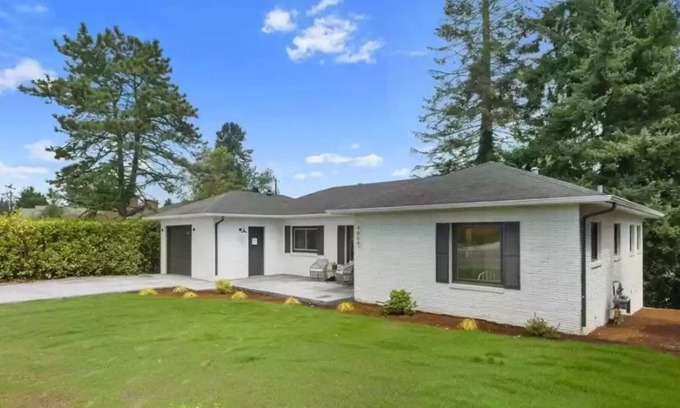 Everett House | Two-story home with spacious yard, washer/dryer & central AC- dog-friendly