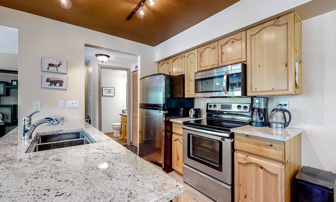 Village North House | Two-Story Mountain View Condo w/Gas Grill, Private Hot Tub, Fireplace, Free WiFi