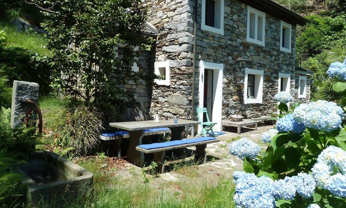 Brissago House | Typical rustico on the edge of the village idyllically bordering the forest