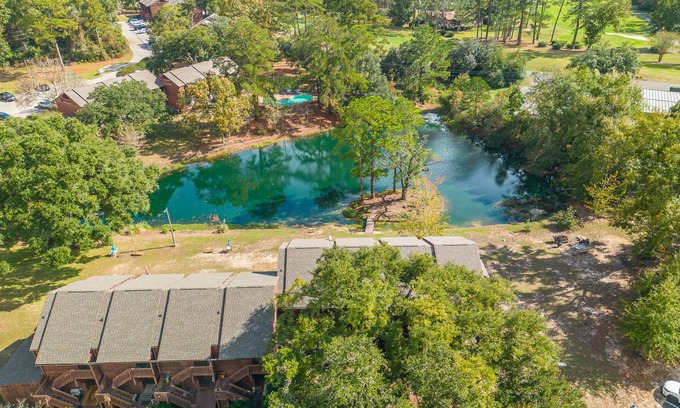Diamondhead Condo | unFOREgettable 19th hole - steps from the Country Club, Golf & Pools - Pets OK!