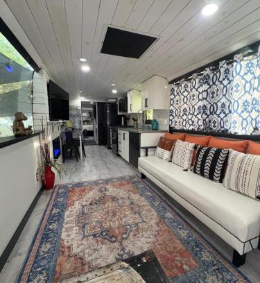 Clermont Villa | Unique Adventure Awaits in This Custom Tour Bus Conversion!