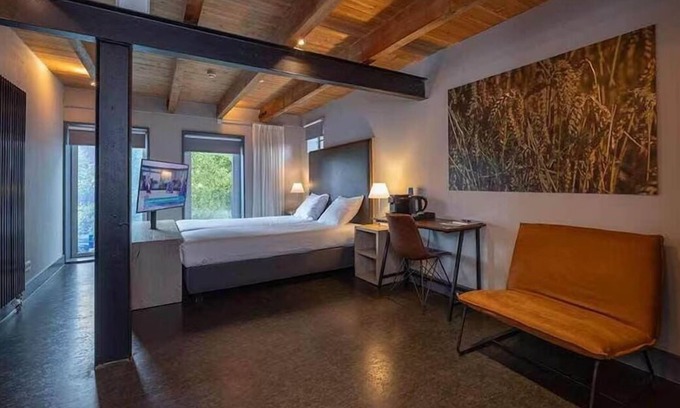 Coevorden Hotel | Unique Getaway: Castle Views from Historic Grain Warehouse