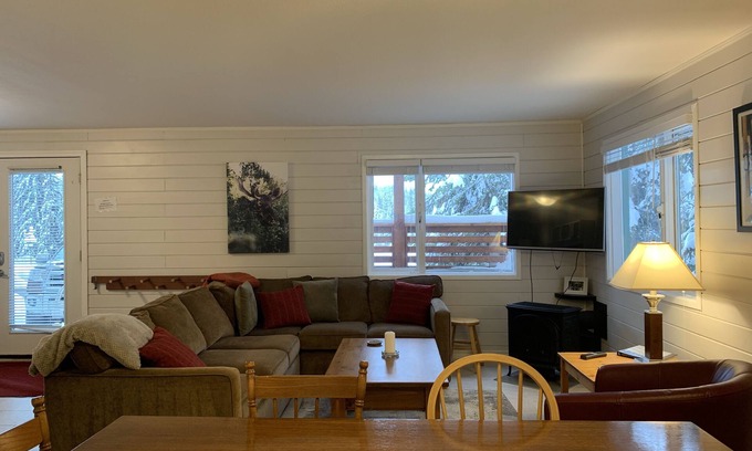 Silver Star Mountain Apartment | Updated Bright Ground Floor Suite - close to the village, backs onto chairlift