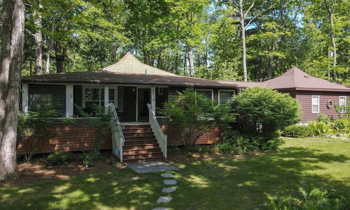 Charlevoix House | Updated cabin sleeps 8. Pet friendly, and has private neighborhood beach.