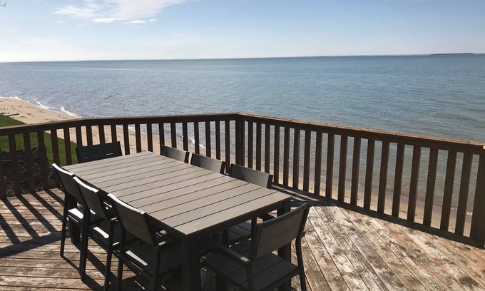 Pigeon House | Updated Cottage with Large Deck & Private Beach on Caseville's Sand Point