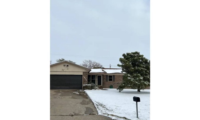 Guymon House | Updated three bedroom home across from park