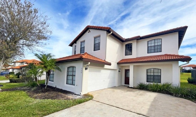 Four Corners House | Upgraded pool home with hot tub and games/movie room - gated resort 6 miles from Disney!