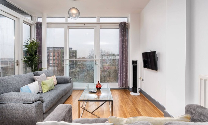 The Westside Apartment | Urban Oasis: Garden Views, Balcony, Free Parking