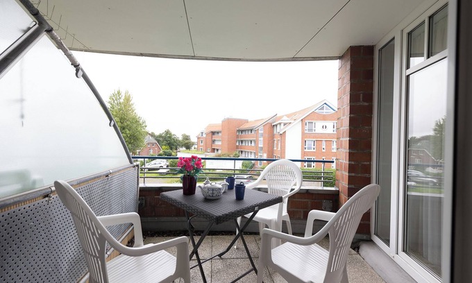 Dorumer Neufeld Apartment | Vacation apartment Kormoranweg 42-203. With balcony and close to the beach.