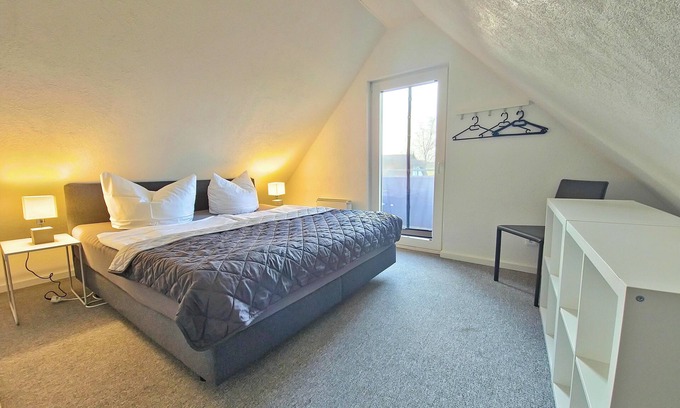 Neeberg House | Vacation apartment 2 - Achterwasser: Comfort with balcony, terrace & water view