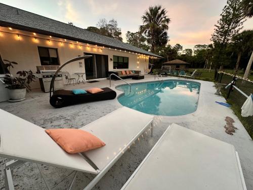 Naples House | Vacation pool home in the woods.