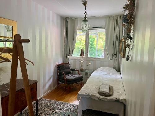 Bastad House | Vackra rum i fin Båstad villa nedanför Italienska vägen med trädgård och nära hav