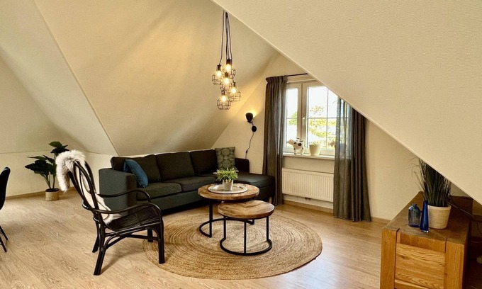 Sint Maartensvlotbrug House | Very spacious and tastefully furnished 3-person apartment near the forest, beach and sea with free WIFI, in a quiet, green and small-scale holiday park.