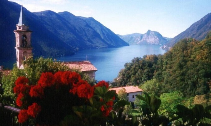 San Mamete Apartment | View to the lake, sun terrace, Mediterranean garden, cosy flat