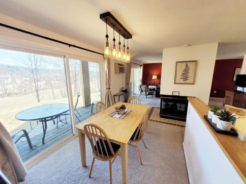 Stow Apartment | views shared hot tub in Stowe