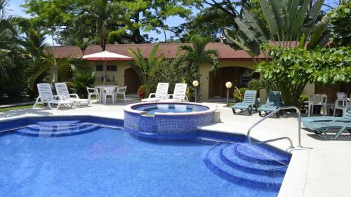 Barrio Ricos y Famosos Hotel | Villa Creole