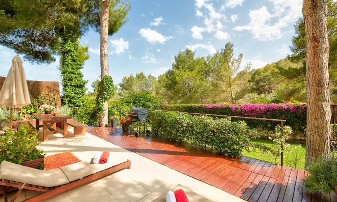 Santa Eulalia del Rio Villa | Villa 'Dorada' with Sea Views, Wi-Fi and Air Conditioning