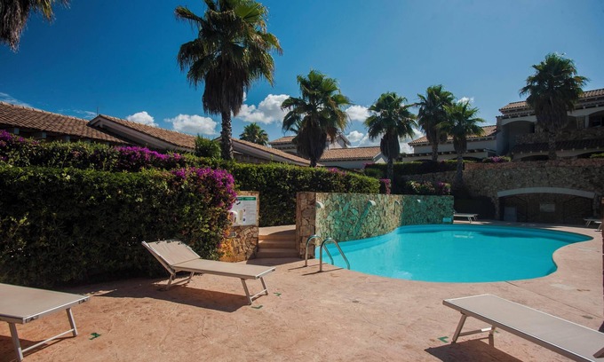 Porto Pino Villa | Villa Elegance Sabrina near the beach with pool, air conditioning, garden, and terrace