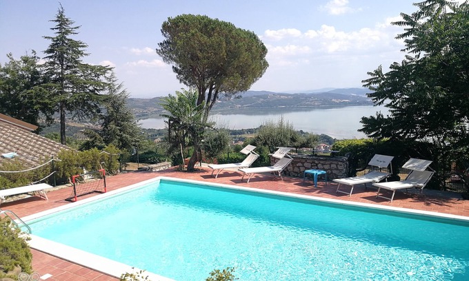 Passignano sul Trasimeno Villa | Villa with pool surrounded by nature with stunning views of Lake Trasimeno