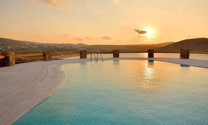 Ftelia Villa | Villa Juliet, beautiful beachfront villa in Mykonos with amazing sunset view by Elite Estates.
